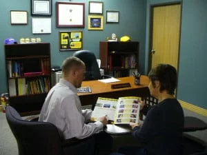 Dr. Trosclair during a consultation with a patient.