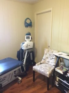  A view of the spinal decompression table and the posture pumps that help restore spine curves