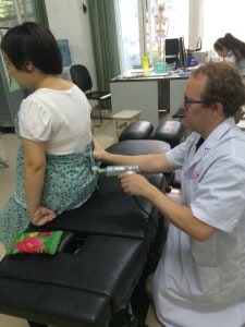 Adjusting a 7 month pregnant patient using the impulse iQ.