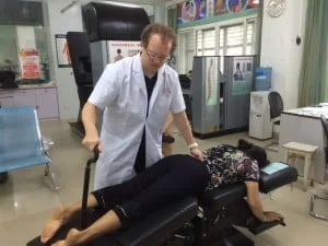 Flexion-Distraction table being utilized to relieve disc bulge pain.