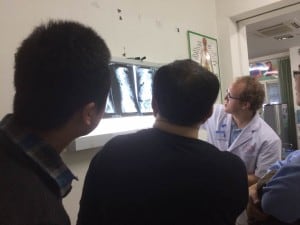 Evaluating and discussing the x-ray and MRI findings.