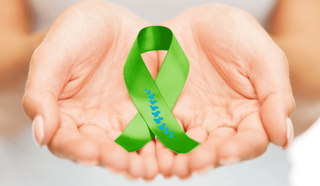 awareness green ribbon hand